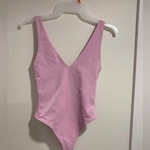 Artiza babaton  body suit never worn too small , size Xs